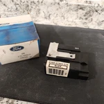 Nos Ford Control E7FZ-8B658-A, E7EB-8C609-A1B. Fixed Price $12.00.