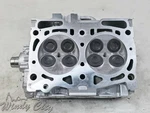 2.5L Subaru Remanufactured Left Side Cylinder Head #E25S. Fixed Price $475.00.
