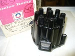 1958-63 Corvette Nos Delco Dual Window Distributor Cap Brass 1941551. Fixed Price $239.99.