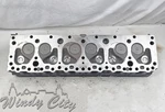 235 Chevy Remanufactured Cylinder Head # 3835913. Fixed Price $1250.00.