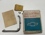 Nos Gm 1965-69 Chevrolet Corvair Gas Tank Filler Door Guard 986078 1C. Fixed Price $34.95.