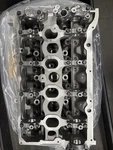 Genuine Mazda Cylinder Head PYY210SJ0. Fixed Price $1051.47.