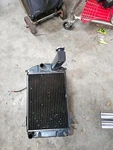 *like New* Triumph TR3 Radiator W/ Revotec Cooling Fan (long Neck No Crank Hole). Fixed Price $450.00.