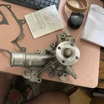 (1148) Ford Water Pump RF-E9SE-8505-CC. Fixed Price $50.00.