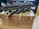 New Porsche S4 5.0 Cylinder Head Original Box 9281044131R 92810401402. Fixed Price $2830.44.