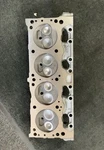 Remanufactured Chrysler 5.2L 75-84 Cylinder Head Smog. Fixed Price $495.00.