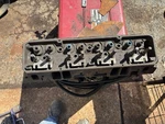 14011034 Chevy Angle Plug Head. Fixed Price $225.00.