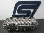 1975-1978 Toyota Corolla 1.6L 2T Cylinder Head (bare: No Camshaft Rockers). Fixed Price $284.95.