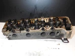 Left Engine Cylinder Head 1170164501 1986-89 Mercedes Benz R107 560SL 560SEC. Fixed Price $269.00.