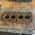 Triumph TR3/TR4 Cylinder Head 302137 P62. Fixed Price $250.00.