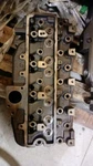 John Deere Cylinder Head R121402. Fixed Price $250.00.