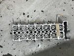*rebuilt* M57 Cylinder Head, 7792753.9. Fixed Price $800.00.