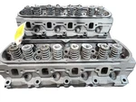 Pair Of Remanufactured Ford 302 Cylinder Heads CASTING#E6SE '86-'91. Fixed Price $595.00.