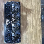E9NN6090-AE Cylinder Head New. Holland. Fixed Price $899.00.