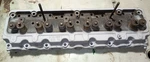 Chevy 235 Engine 3701887 Cylinder Head Core, For Parts, Clean No Visible Cracks. Fixed Price $175.50.