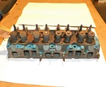 1978-1980 2.5L Pontiac L-4 Cylinder Head Casting #498597 Rebuilt. Fixed Price $250.00.