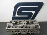 1989-90 Mitsubishi Mirage / Colt 1.5L 4G15 Cylinder Head (no Cam Rockers). Fixed Price $284.95.