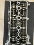 Rebuildable Cylinder Head From 2004 Toyota RAV4 2.4L 11197824. Fixed Price $250.00.