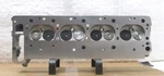 Reconditioned Mercedes Beenz Left Cylinder Head For 5.0L/303 Cid V8, 16 Valve. Fixed Price $670.00.