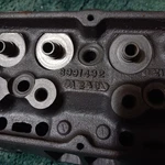 Pair Small Block Chevy 492 Angle Plug Over The Counter Heads. Bare. Fixed Price $950.00.