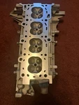 2000-2002 Saturn 1.9 Dohc Cylinder Head. Fixed Price $850.00.
