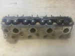 Genuine Porsche 944 Complete Cylinder Head With Valves & Springs. Fixed Price $299.99.
