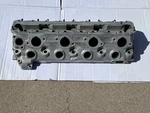 Very Nice 1985 Original Genuine Porsche Cylinder Head 944.106.303.6R. Fixed Price $399.99.