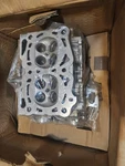 Genuine Subaru Cylinder Head 11063AB250. Fixed Price $500.00.
