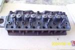 Triumph TR4, TR3 Engine Cylinder Head, Complete # 3025137. Fixed Price $400.00.
