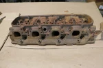 Chevy 454 Rectagular Port Cast #3272880, Open Chanber Hi Perf Head Core Only. Fixed Price $250.00.